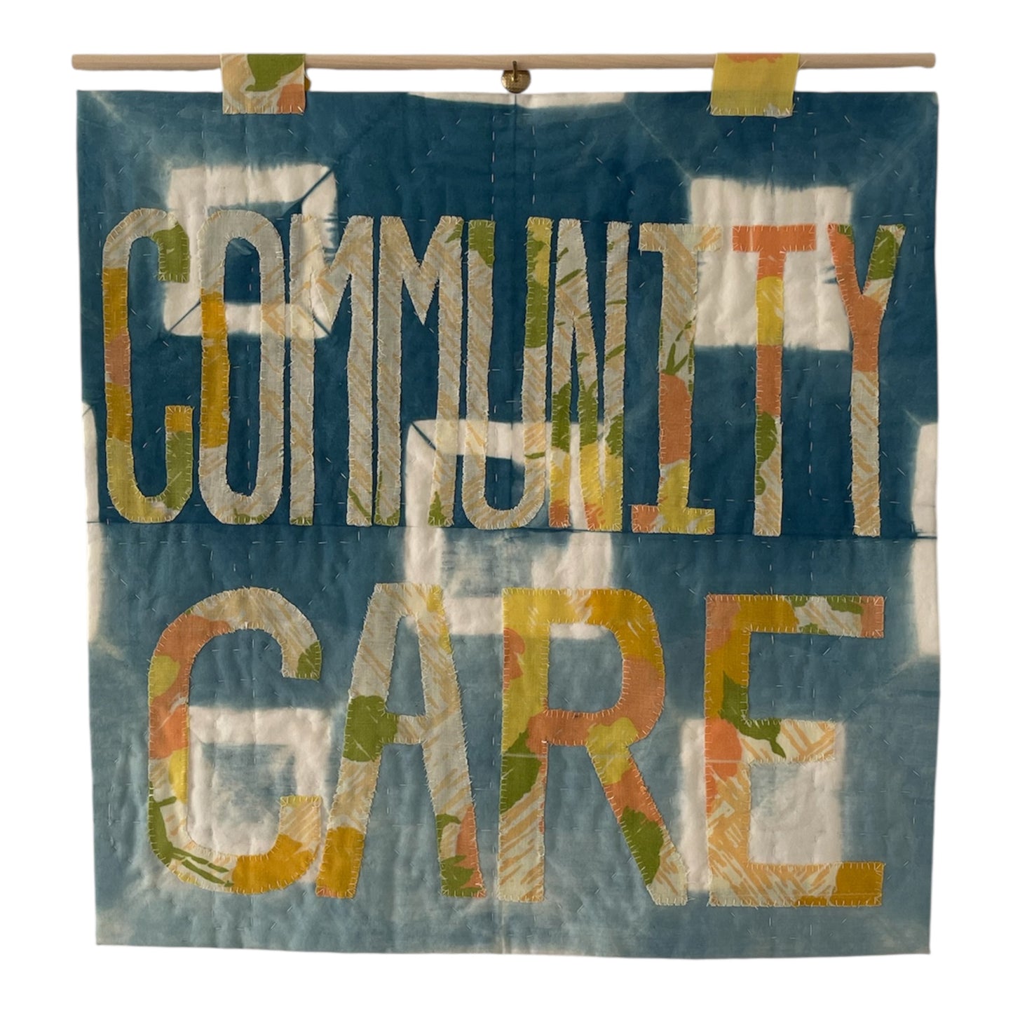 Community Care Quilted Wall Hanging